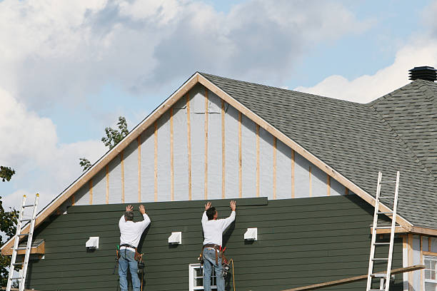 Professional Storm Damage Siding Repair technician working in Lancaster, VA